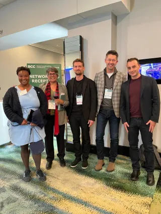 Group of attendees at a conference networking reception